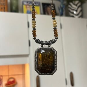 Chico’s Silver and Amber Color Pendant Necklace